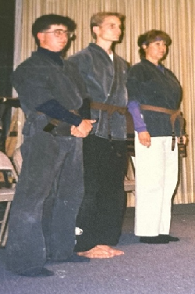 15 December 1990: Black Belt Coronation
Jason “J.B.” Brown, Greg “Maddog” Bendel, Genny “Cougar” Edge